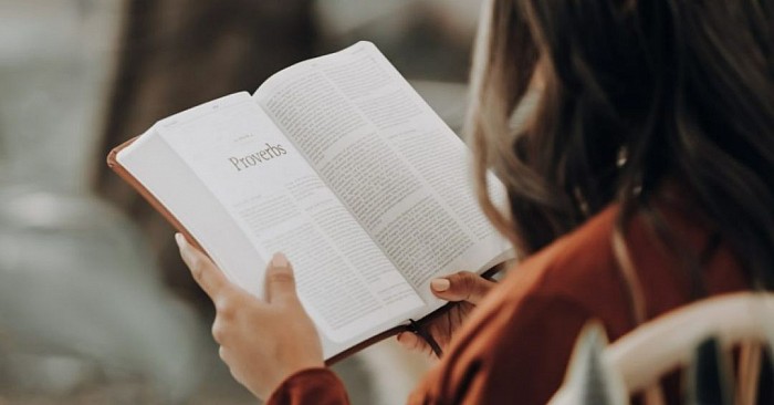 Woman reading the Bible